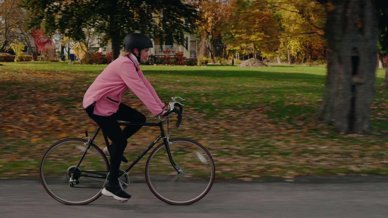 Woman riding a bicycle in the countryside