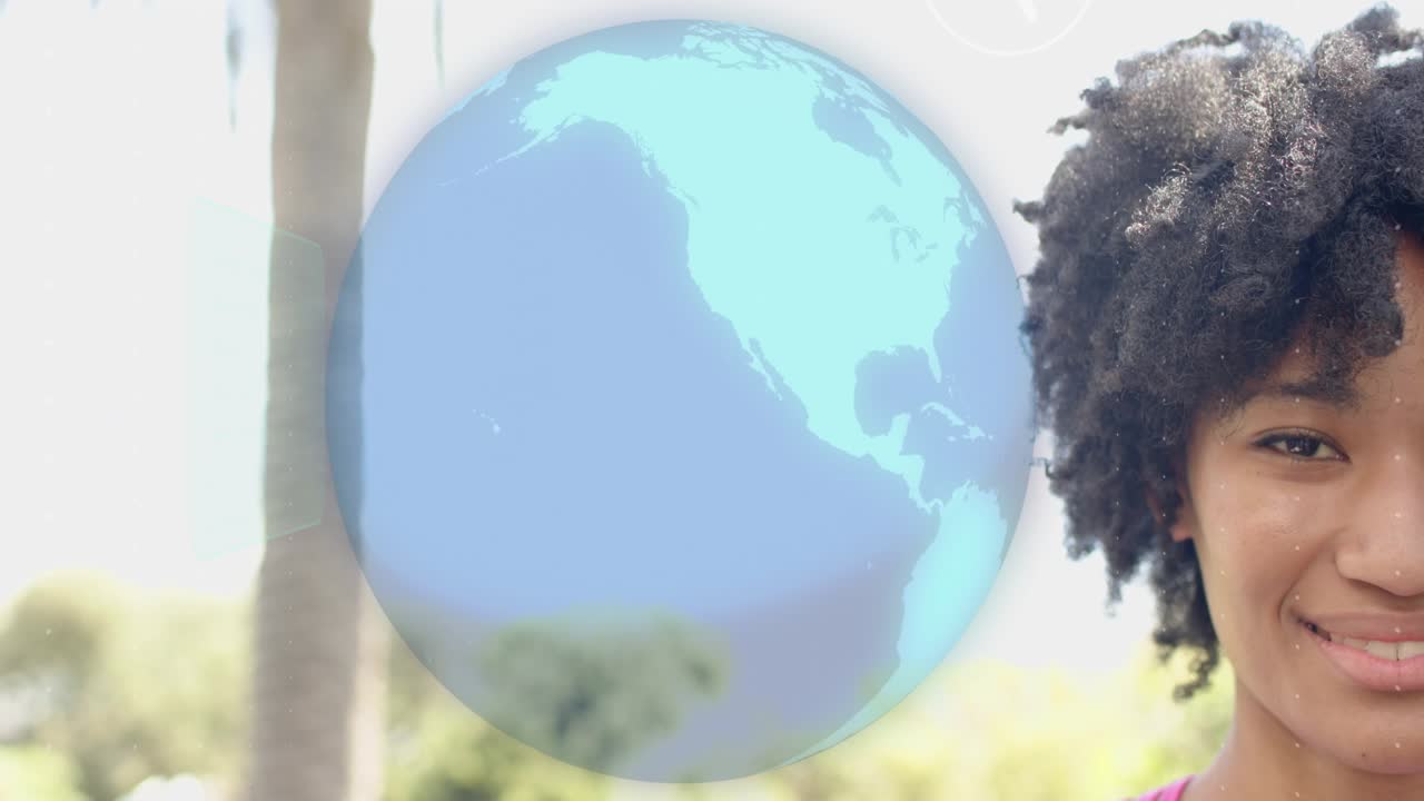 Femme debout devant un globe qui semble tourner, des icônes en orbite, des panneaux sur la joue, montrant la technologie pour les créateurs