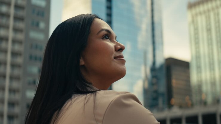 Confident Businesswoman Looking Towards the Future in the City
