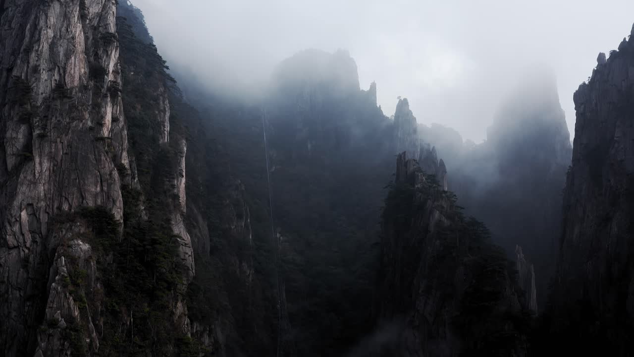 Clouds covering mountain tops. Beautiful aerial view of Yellow Mountain, Anhui province China