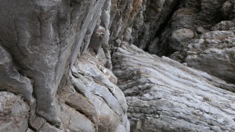 Gray,-abstract-rock-formations-with-different-surfaces-and-textures