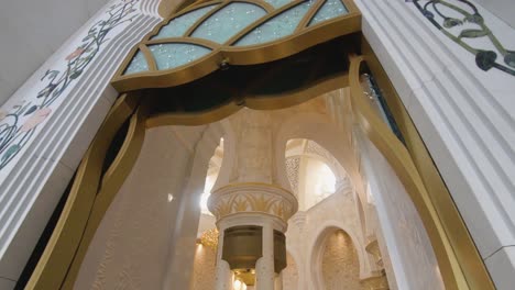 wide dolly shot showing the beautiful architecture inside the palace court in abu dhabi