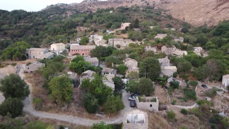 revealing aerial of perithia oldest village of corfu, greece