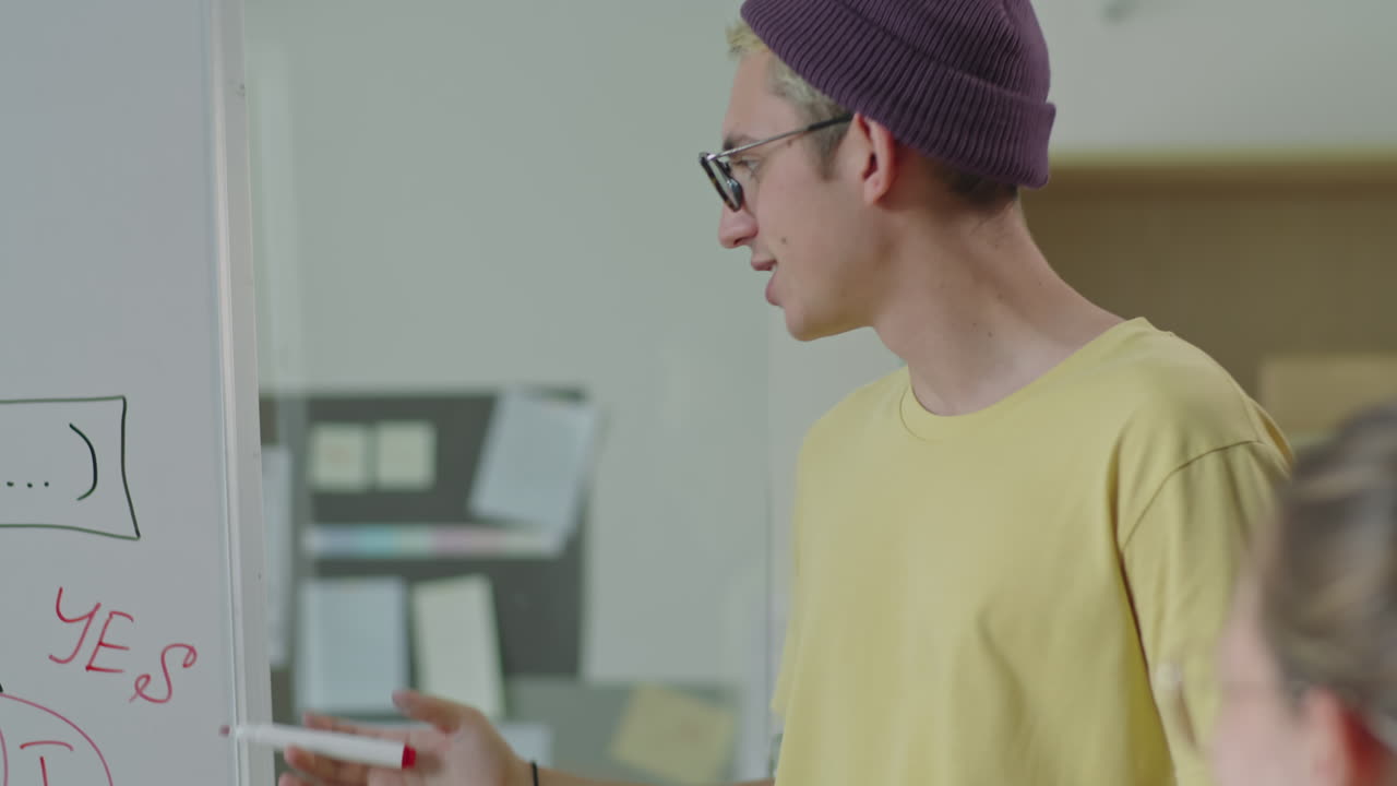 Gen Z Man Presenting IT Project on Business Meeting