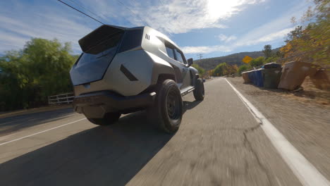 Cinematic-FPV-following-shot-of-a-futuristic-police-SUV