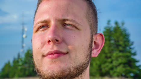 close up on man face with beard staring