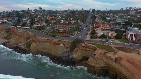 Orbital-Drone-Shot-Of-Sunset-Cliffs-In-The-Coastline-Of-San-Diego,-California---aerial-shot