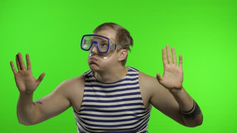 Emotional-man-tourist-in-underwater-mask,-striped-sailor-shirt-on-chroma-key