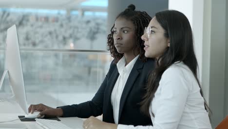 businesswomen using desktop computer