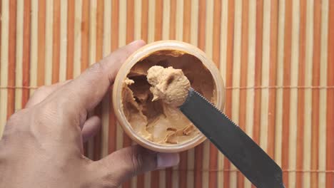 opening a jar of peanut butter