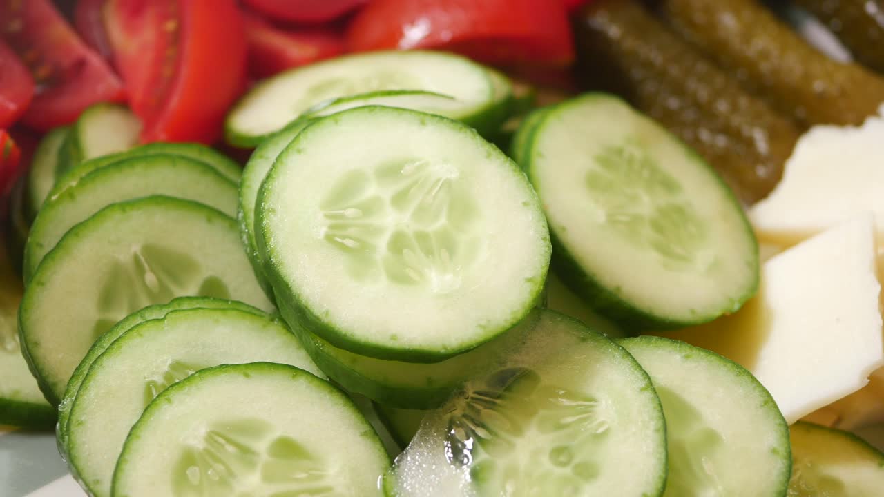 Cucumber, Tomatoes, Pickles, and Cheese
