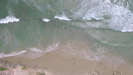 birds eye view of a light blue caribbean sea in a venezuelan beach