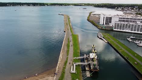 Aerial-footage-over-a-jetty-in-Salem,-Massachusetts