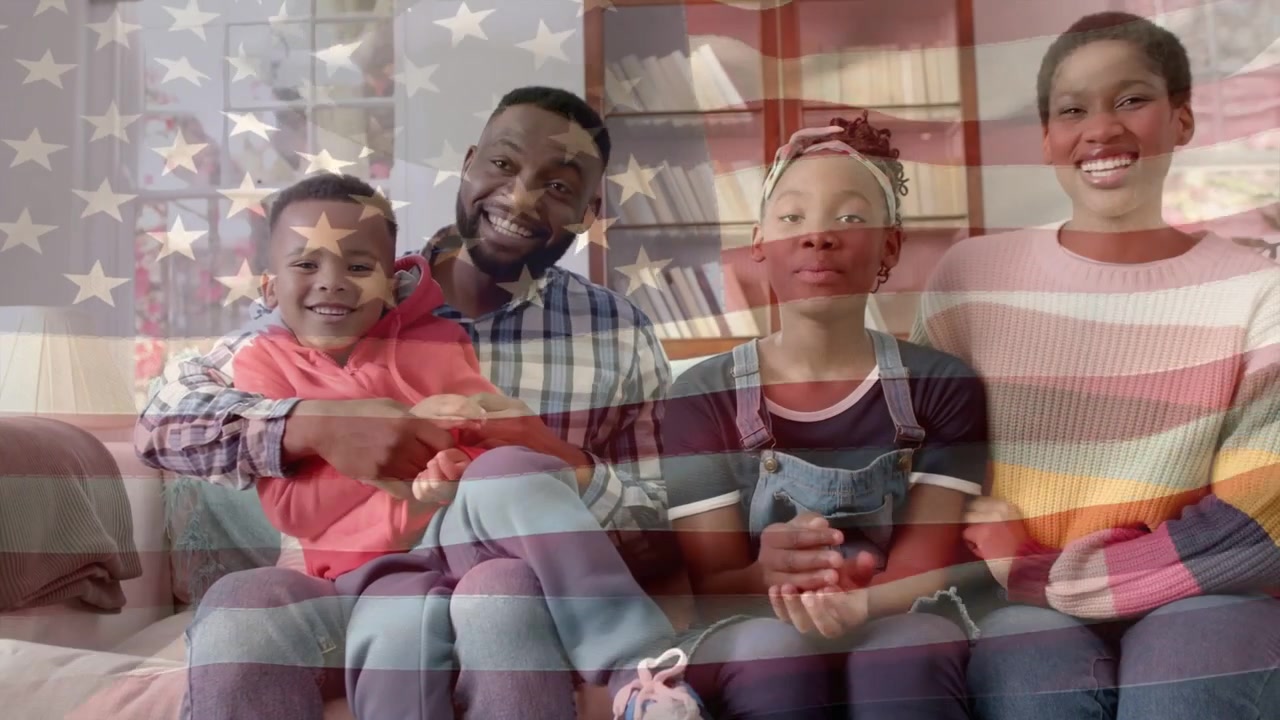 Dad tickling son, kids laughing with transparent American flag overlay showing family unity in ads