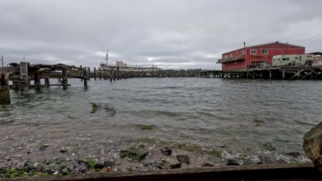 Docked-boat-at-a-wooden-pier