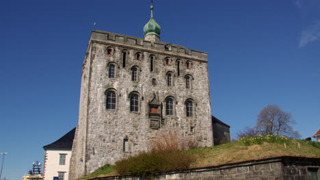 wide shot of the bergenhus fortress tower at bergen