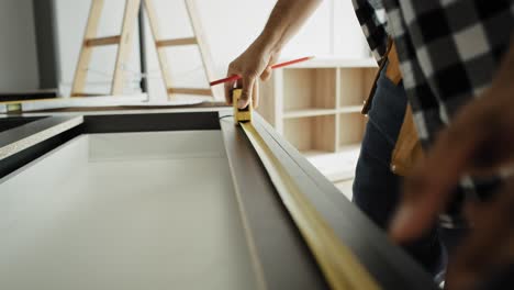 Close-up-video-of-measuring-kitchen-furniture