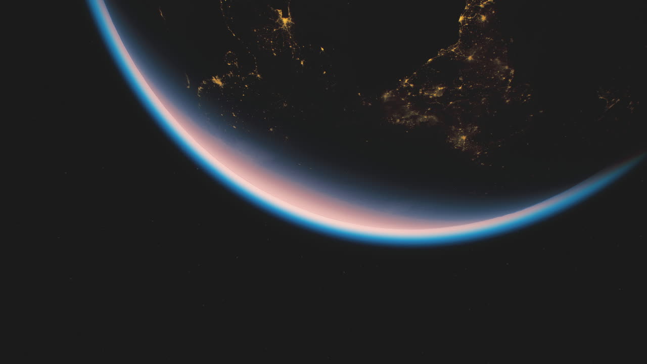 View of earth from space highlighting atmospheric layers and lights
