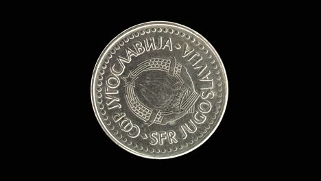 yugoslavia 1987 100 dinara coin obverse with state emblem of six torches and star rotating on black background