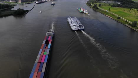 transportation barges sailing on dutch river