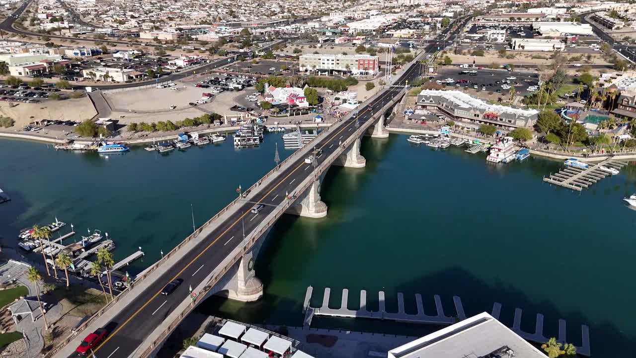 Drone Panning around London Bridge in Lake Havasu City Arizona. Late Fall on a Sunny Day. Cars Driving on Bridge