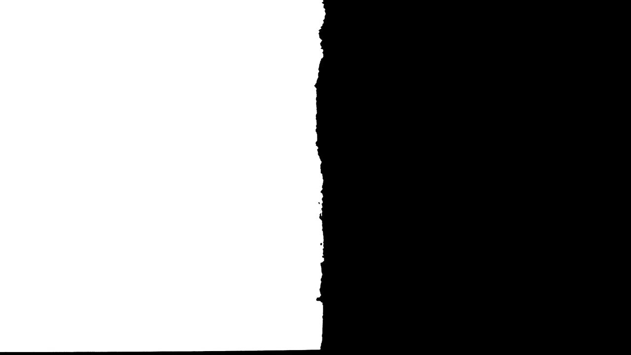 Dynamic Torn Paper Reveal Transition from Black to White