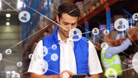 Animation-of-network-of-profile-icons-on-caucasian-male-supervisor-using-digital-tablet-at-warehouse