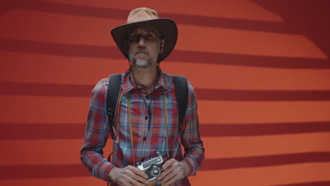 man with vintage camera
