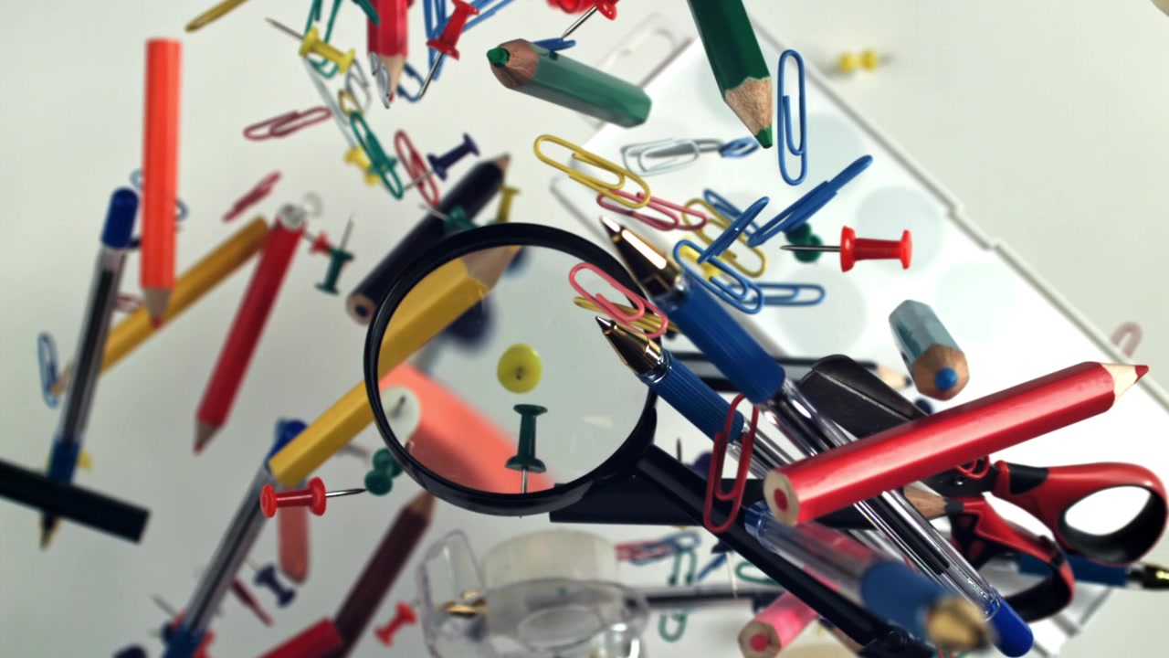 Colorful Office and School Supplies Floating in Slow Motion