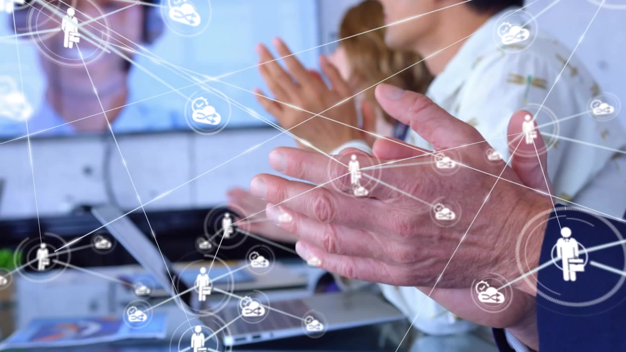 Animation of network of connections over diverse business people in office
