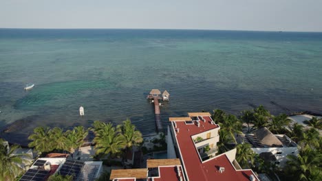 Beautiful-aerial-view-of-seaside-villa-by-the-ocean-on-a-sunny-day-in-Mexico-City