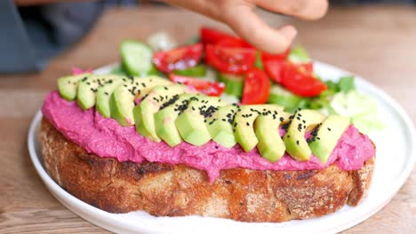 avocado toast with beet hummus and salad