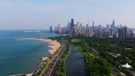 amazing drone shot above chicago, lake michigan on summer day