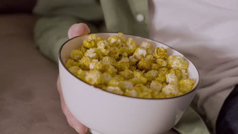 close up of sweet caramel popcorn in bowl