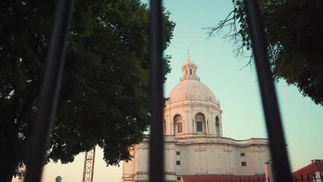 lisbon cathedral national pantheon through fences at dawn in slider motion