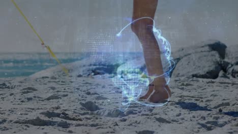 animation of globe with connecting lines over low section of caucasian woman walking on sandy beach