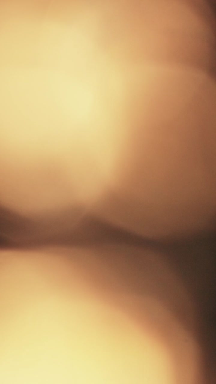 Perdite di Luce Calda Astratte e Sovrapposizione Bokeh
