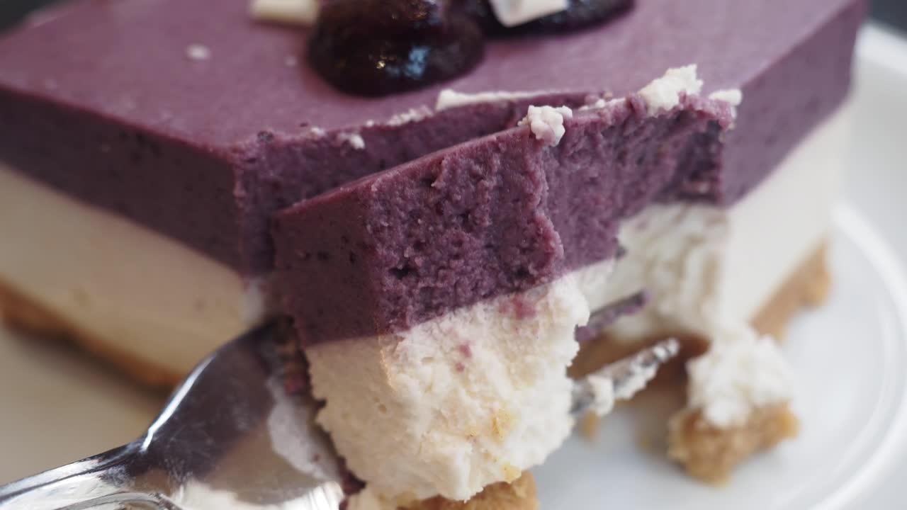 Purple and White Cheesecake with a Bite