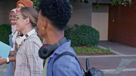group of diverse students walking on campus