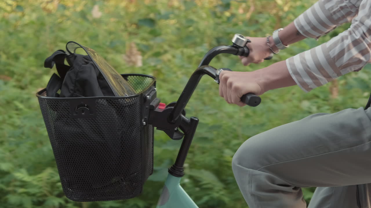 Female Riding Bike With Basket