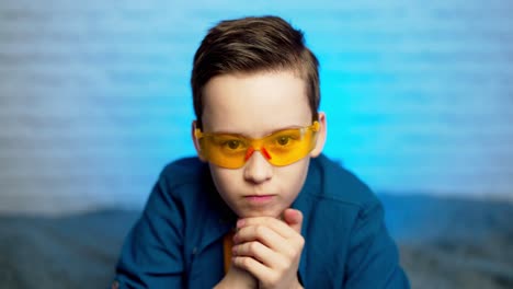 boy in a medical glasses. concept of quarantine and protection virus, flu, epidemic covid-19. social distancing, self- isolation. coronavirus quarantine