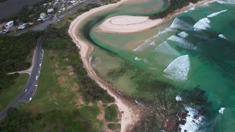 aerial view over hastings point cudgera creek in new south wales, australia - drone shot