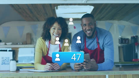 smiling couple in aprons using smartphone, social media followers count animation over