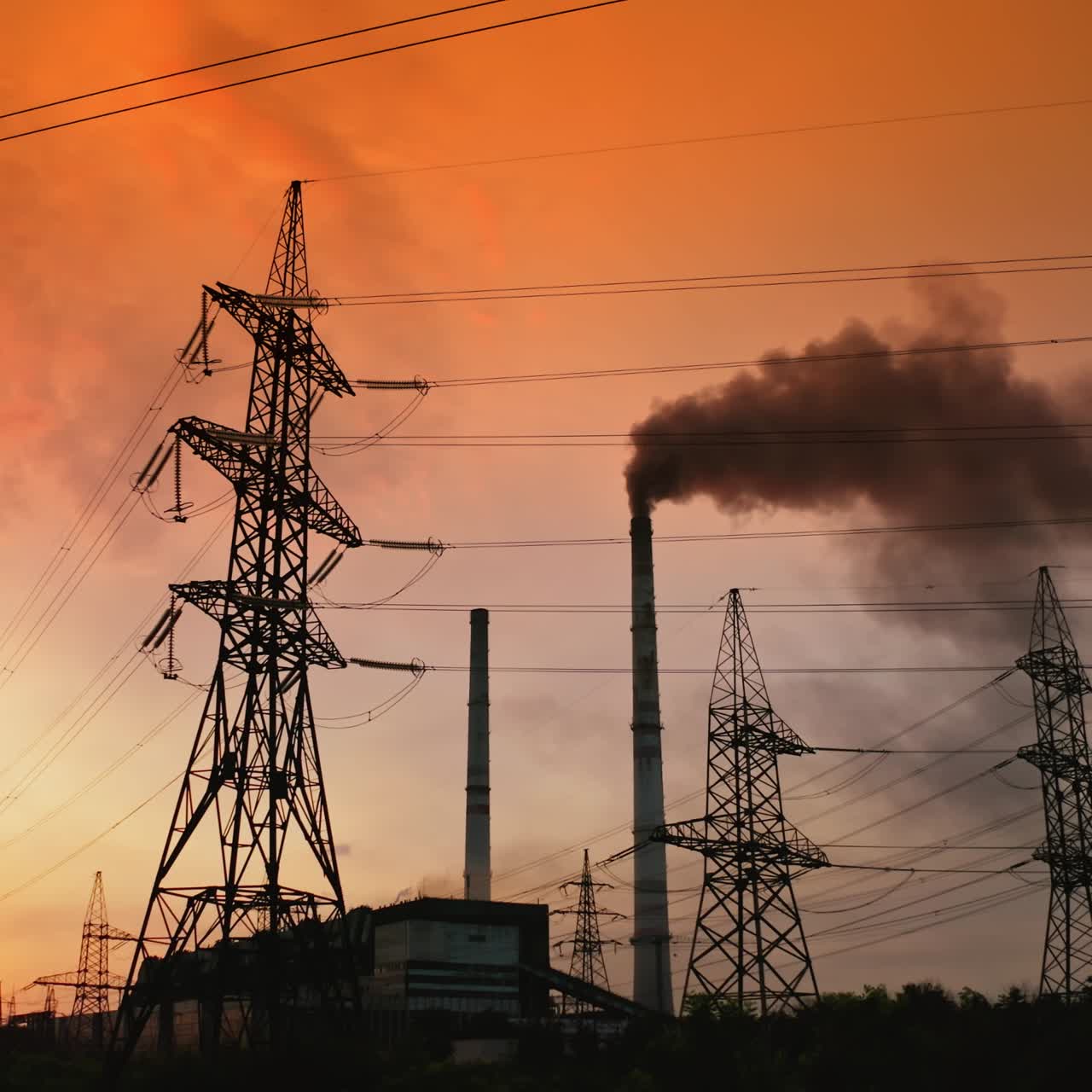 Transformation station and power plant. Grid of high voltage power lines and wires