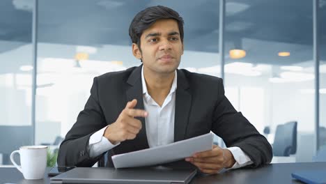 angry indian manager shouting on employees