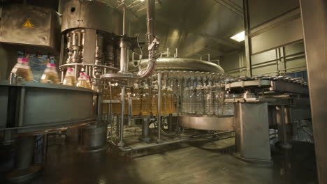 automated beverage bottling line in a factory