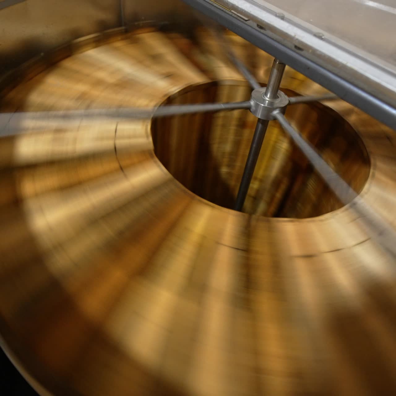 Organic fresh sweet honey harvesting. Honey frames rotating in centrifuge