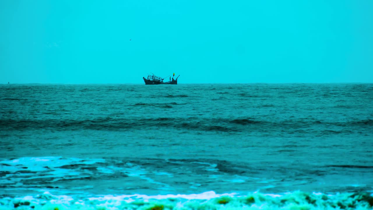 Distant View Of Fishing Trawler In Bay Of Bengal With Powerful Waves On A Stormy Weather
