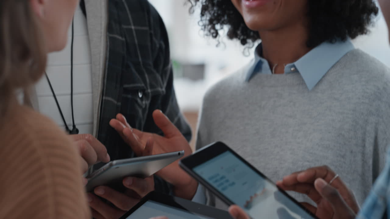 diverse business team using digital tablet computers discussing graph research data sharing ideas brainstorming in office workplace