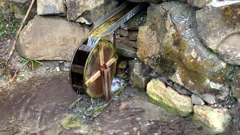 Fresh-running-water-from-the-mountain-passing-through-stones